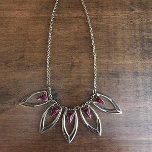 pretty maroon and gold-colored metal necklace